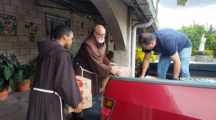 daniel-2 Br, Daniel is shown helping at our AGAPE mission in El Salvador. He and the late Fr. Jack load boxes of supplies into a local man’s truck.