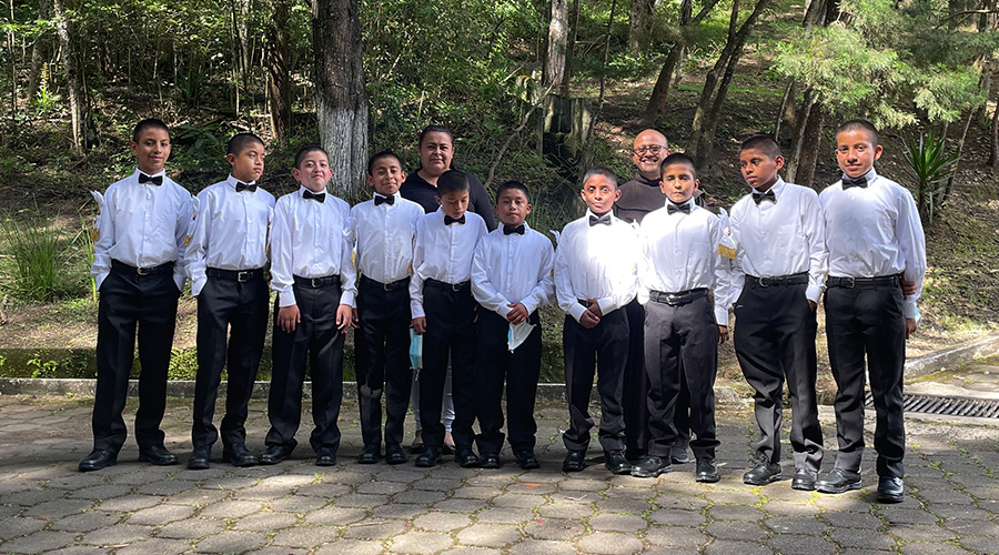 Fr-Joaquin-with-group-of-boys Fr. Joaquin, OFM, with a group of schoolboys at Valley of the Angels mission in Guatemala